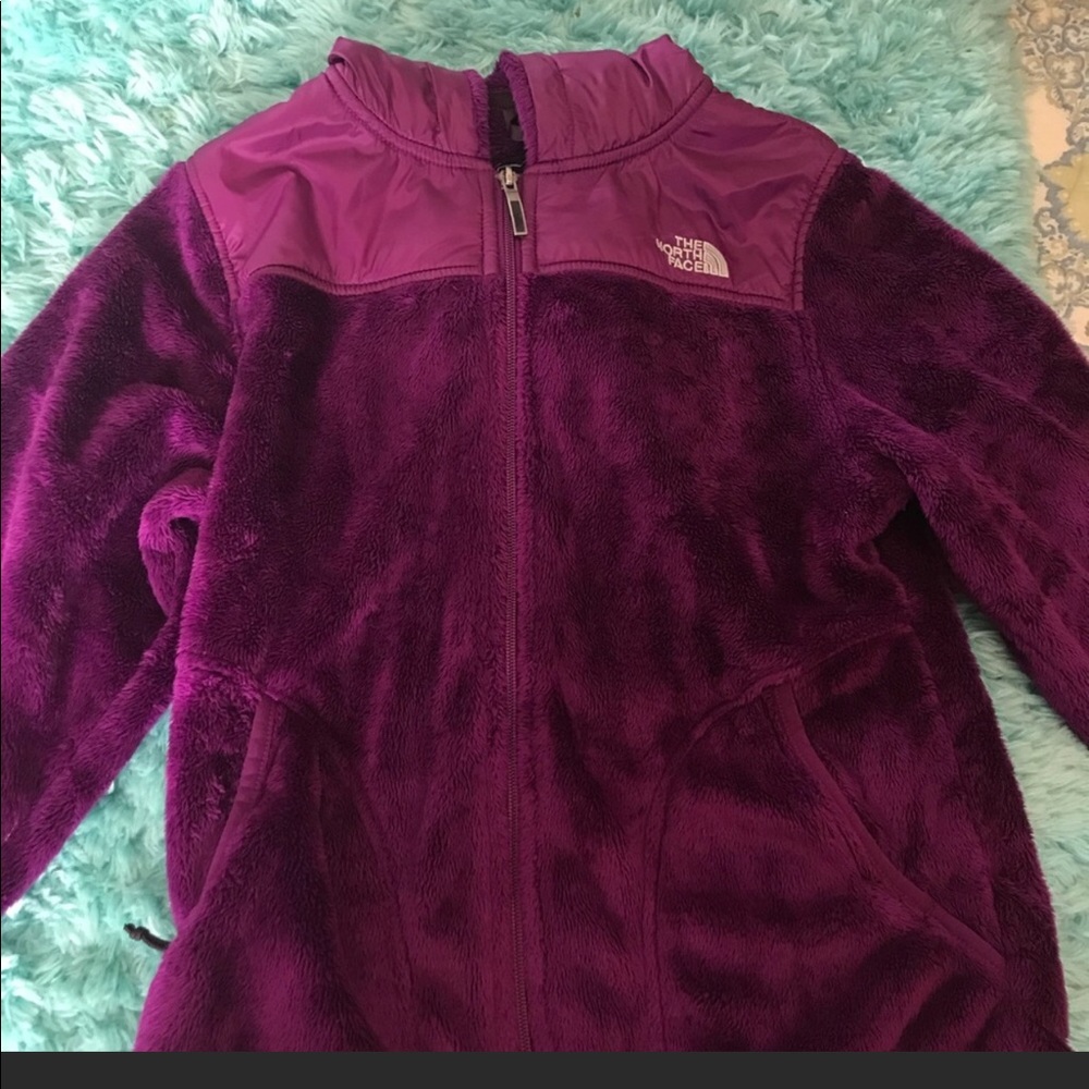 Magenta fuzzy hooded North Face jacket